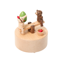 Boîte à musique artisanale en bois, balançoire à manivelle ronde, design rotatif de dessin animé