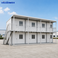 VICDOWEX Maison Conteneur Modulaire Contemporaine Préfabriquée en Panneaux Sandwich en Acier pour Entrepôt, Camp ou Bureau