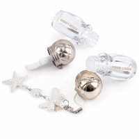 Tube de brillant à lèvres vide de luxe 4 ml avec trou pour chaîne, capuchon boule matelassé, contenant de fard à joues liquide doré avec grande brosse