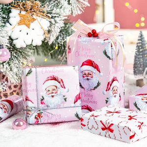 Papel de Regalo Navideño Burymento, 17 Pulgadas x 32.8 Pies, Reversible, Diseño de Bastones de Caramelo Rosados con Santa Claus - Product Image 2