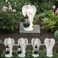 Statua di angelo in resina con lanterna e colomba con ghirlanda floreale dipinta a mano figurine Decorative per esterni da giardino