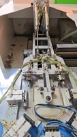 Machine d'emballage entièrement automatique d'occasion, idéale pour la production de jeans et de vêtements d'intérieur, permettant de réduire les coûts de main-d'œuvre et d'augmenter l'efficacité.