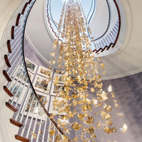 Lustres en verre céramique et acier inoxydable à LED longs et luxueux à prix raisonnable pour hôtel, villa, escalier, décoration moderne