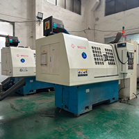 Máquina rectificadora interna CNC MK2110 de la Fábrica de Máquinas Herramienta No. 1 de Wuxi para rectificado preciso de orificios y casquillos internos.