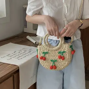 Bolso de paja de cereza bolso tejido a mano de paja de ganchillo reutilizable bolso cruzado diseño de fruta mini bolso lindo para niños