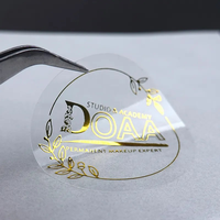Autocollants en papier doré personnalisés en gros, étiquettes décoratives transparentes imperméables imprimées pour le branding et les logos de produits