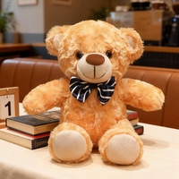 Ours en peluche classique brun beige ivoire foncé en polyester de 28 cm, avec nœud rouge et bleu, cadeau d'anniversaire pour enfants, souvenir, vente chaude