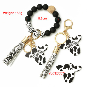 Nouveau bracelet en perles <span class=keywords><strong>de</strong></span> silicone pour hommes porte-clés <span class=keywords><strong>de</strong></span> style occidental tête <span class=keywords><strong>de</strong></span> vache à <span class=keywords><strong>copeaux</strong></span> <span class=keywords><strong>de</strong></span> <span class=keywords><strong>bois</strong></span> MAMA - Product Image 3