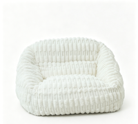 Canapé paresseux simple rayé en fausse fourrure de lapin style crème, compressible et confortable