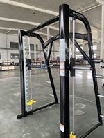 Machine Smith professionnelle à charge par plaques d'acier pour squats et exercices à câble, avec rack de musculation pour clubs de fitness