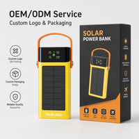 Batterie externe solaire 30000mAh 22.5W à charge rapide avec câbles 4-en-1 intégrés et lampe torche LED pour le camping et les voyages