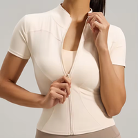 Veste de yoga et de course à manches courtes pour femme avec col montant, fermeture éclair intégrale, séchage rapide, anti-déchirure et design ajusté