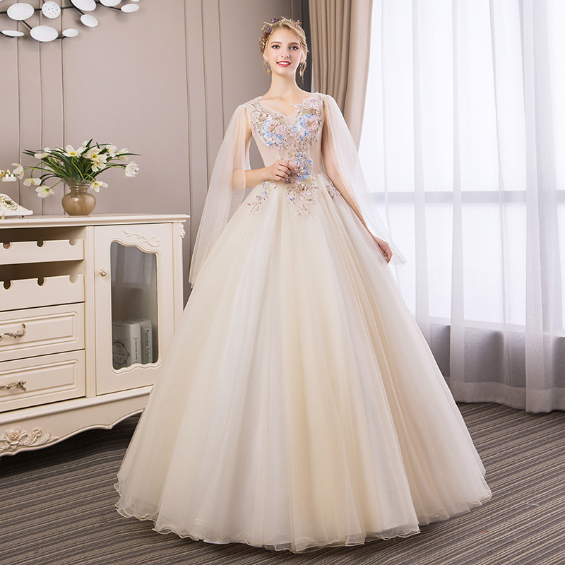 Champagne-colored backpack