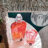 Bouteilles à liqueur en verre cristal à bouchon basculant, avec capsule couronne estampée à chaud, scellées pour le brandy, les sodas, les jus, le café et les boissons – Vente chaude