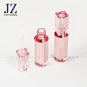 Jinze tabung Lipgloss mewah 2.5ml, wadah lipstik bening tutup persegi botol Lipgloss bulat transparan merah untuk kosmetik