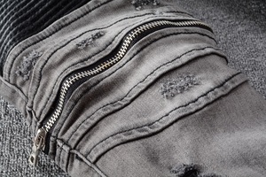Fabrika toptan özel elastan pamuklu kumaş moda Trendy orta bel erkekler boya splatlatyırtık kot