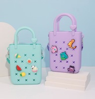 Bas quantité minimale de commande mode enfants étanche bandoulière sac à main sacs de plage 2024 Silicone Mini sac avec breloques accessoires