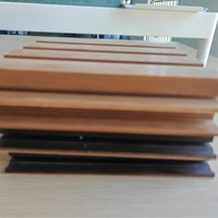Panneau mural décoratif en PVC bois-plastique imperméable et ignifuge Jiangxi, panneau de grille sans joint pour fond de télévision, usage domestique