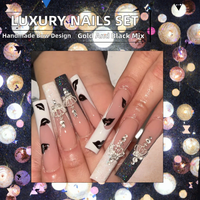 Ongles à presser de luxe tendance pour soirée, longs, avec accents or et noir, ornements en forme de nœud disposés à la main, lot de 24 pièces