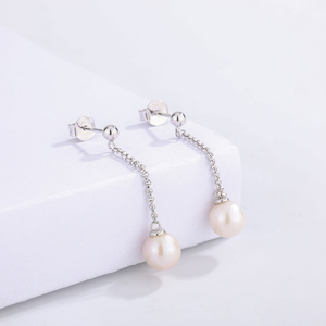 Boucles d'oreilles pendantes en cuivre avec perles coquillages : Vente en gros de bijoux pendentifs simples et élégants pour femmes - Product Image 3