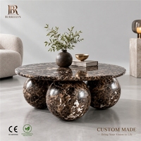 Table basse/secondaire ronde en marbre Emperador foncé de luxe, base sphérique, design moderne sculptural, pour salon de villa