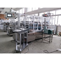 Machine de remplissage automatique de boîtes de poudre à lessive, machine d'emballage de boîtes de poudre à lessive, machine d'emballage de cartons de poudre à lessive