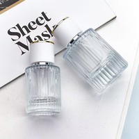 Emballage de bouteille de parfum rechargeable de marques de distributeur personnalisées échantillon de vaporisateur en verre vertical transparent bouteille de parfum de recharge de 50 ml