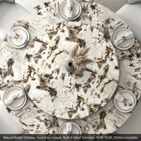 Table à manger ronde en marbre brun fantaisie naturel avec plateau tournant silencieux intégré, base sculpturale mate foncée, OEM pour hôtels et restaurants