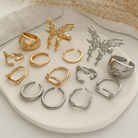 Ornamen kupu-kupu dingin Eropa dan Amerika cincin berkilau cairan tidak beraturan 7 buah Cincin Set Aksesori Wanita