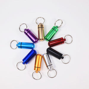 Mini porte-clés en métal coloré, tube de rangement portable, conteneur étanche, forme ronde, capsule en alliage multicolore - Product Image 1