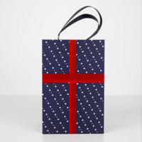 Boîte cadeau personnalisée de style livre à double ouverture, imprimé pois bleu marine et blanc, avec poignée en ruban noir, insert en mousse EPE personnalisé, recyclable