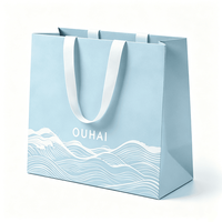 Sacs cadeaux en papier personnalisés avec logo imprimé pour boutique de luxe, pour vêtements, chaussures, sous-vêtements et autres produits.