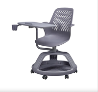 Chaise d'étude moderne à prix réduit avec accoudoirs en plastique confortables et tablette pliable pour l'école et l'appartement