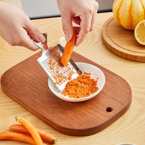 Nueva Placa de Molienda Manual de Acero Inoxidable, Utensilio de Cocina, Rallador de Jengibre, Molinillo Multifuncional para Verduras y Ajo - Product Image 1