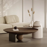 Ensemble de table basse ronde en bois noir courbé de style Japandi avec structure en métal pour salon et maison