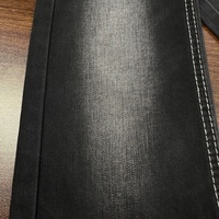 Tissu denim extensible en sergé teint en fil Lizhi XH6082WA, coton lyocell 69*52, noir, en rouleau, pour sacs garçons et filles