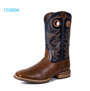 <span class=keywords><strong>Bottes</strong></span> de cowboy personnalisées par le fabricant, style western vintage, en <span class=keywords><strong>cuir</strong></span> bicolore marron avec broderie et bout carré <span class=keywords><strong>bleu</strong></span> <span class=keywords><strong>marine</strong></span>, design ajouré - Product Image 1