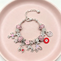 Bracelet porte-bonheur plaqué or tendance avec breloques croix, cerise, léopard, nœud, 7 fleurs rouges et étoile, bijou porte-bonheur