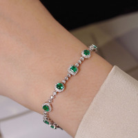 Parures de bijoux élégantes en or 10 carats avec pierres synthétiques, bracelet personnalisé en émeraude pour femmes, prix d'usine