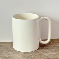 Tasse à café en céramique blanche pour sublimation, grande, à longue poignée, en porcelaine vierge, style minimaliste, pour usage commercial, vente en gros, unité de base