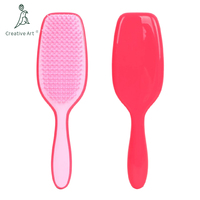 Brosse démêlante en gros pour cheveux bouclés et lisses