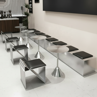 Ensemble de mobilier de salle à manger commercial moderne et minimaliste en métal - Table ronde en acier inoxydable et bancs pour salon