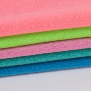 Toptan özel çeşitli renk düz boyalı kanepe oyuncak polar % 100% polyester atkı örme yumuşak polar kadife kumaşlar