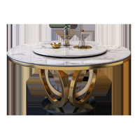 Table à manger ronde de luxe au design italien, plateau en pierre frittée, base sculpturale dorée pour mobilier de salle à manger moderne