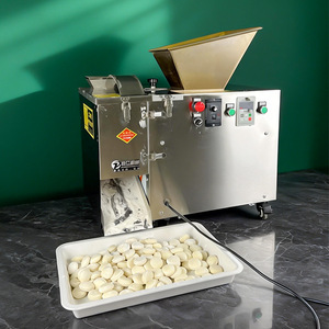 Machine professionnelle électrique industrielle de division et de portionnement automatique de pâte pour la fabrication de boules de pâte, la pâte à frire, la garniture de gâteaux de lune et la pâte à frire. - Product Image 1