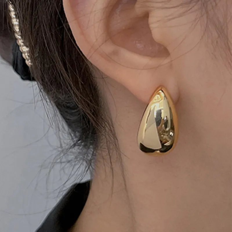 Kaimei Fashion Jewelry rame temperamento minimalista orecchini a forma di goccia fluida orecchini a goccia in oro dorato alla moda