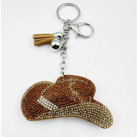 Porte-clés de haute qualité en forme de chapeau de cowboy couleur café, orné de strass étincelants et de pompons, best-seller