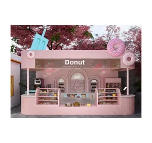 粉色甜甜圈亭设计面包店和甜点摊户外食品酒吧柜台出售