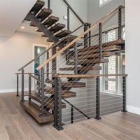 Escalier mono-à-câble moderne à profil bas pour petits appartements, avec balustrade en verre et câbles