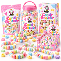 Certificat HACCP/BRC Vente en gros Bonbons durs compressés multicolores aux saveurs fruitées, en forme de fruits de dessin animé, en forme de collier et de bracelet, en vrac, OEM
